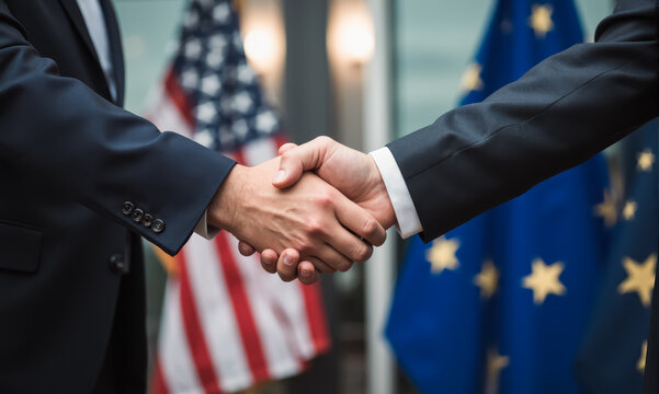 Successful handshake symbolizing cooperation between USA and European Union flags during negotiations agreement teamwork unity partnership trade diplomacy