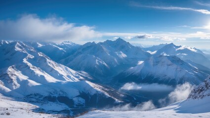 Stunning perspective of the snowy mountains and valley during a sunny winter day. Cold winds blow over the peaks. Panoramic view of snow-covered mountain range.