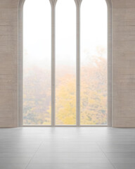 Modern interior with large windows revealing a misty autumn view in daylight