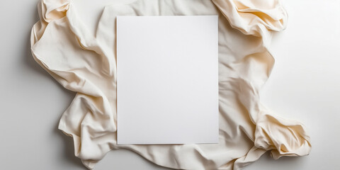 Elegant fabric background and Paper with blank space for text top-down view on a white background copy space