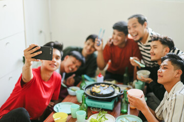 Group of Asian Friends Taking Selfie at Barbecue Dinner Time Using Smartphone
