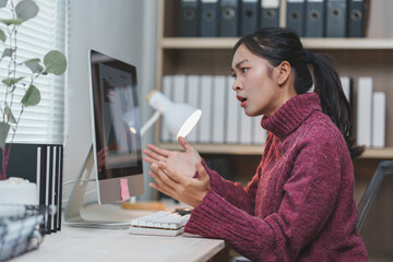 Office worker in a modern setting, expressing frustration while analyzing data on a computer...