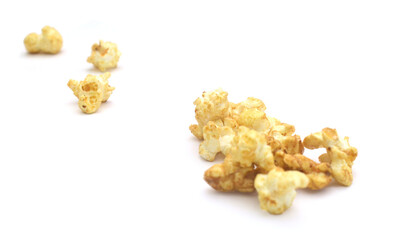Popcorn heap,Close-up of popcorn against white background - stock photo
