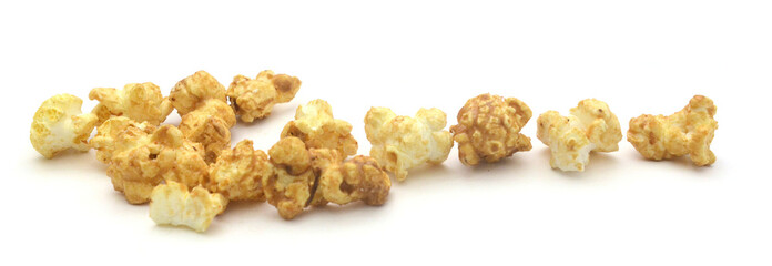 Popcorn heap,Close-up of popcorn against white background - stock photo
