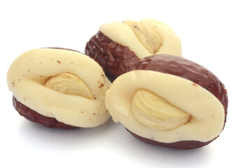 Macadamia nuts isolated on white background - stock photo
