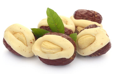 Macadamia nuts isolated on white background - stock photo
