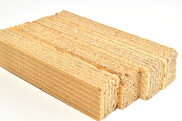 Confectionery sweet crispy wafers lie on a white background.