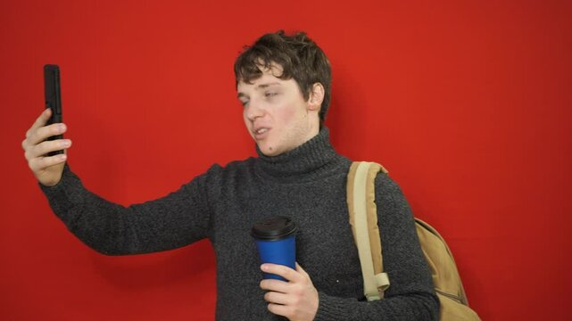 Happy young attractive student after exams.