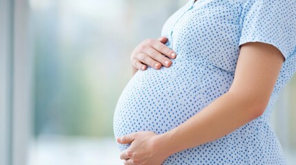 Expecting mother cradling her baby bump in a bright and airy indoor setting during a warm afternoon