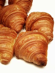 Golden-brown croissants, a perfect breakfast treat.
