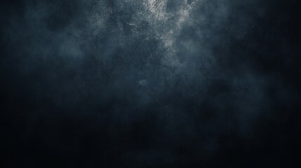 Fototapeta premium Dark blue textured background with smoky, cloudy effect.