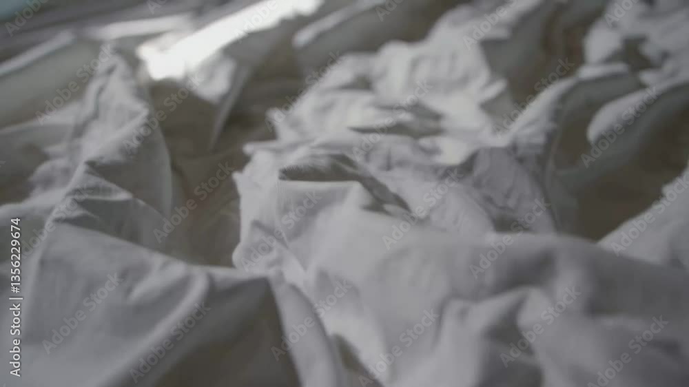 Poster dynamic light patterns on textured fabric capturing playful illuminations