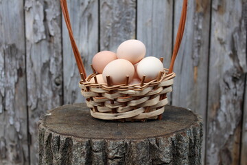 chicken eggs in a basket
