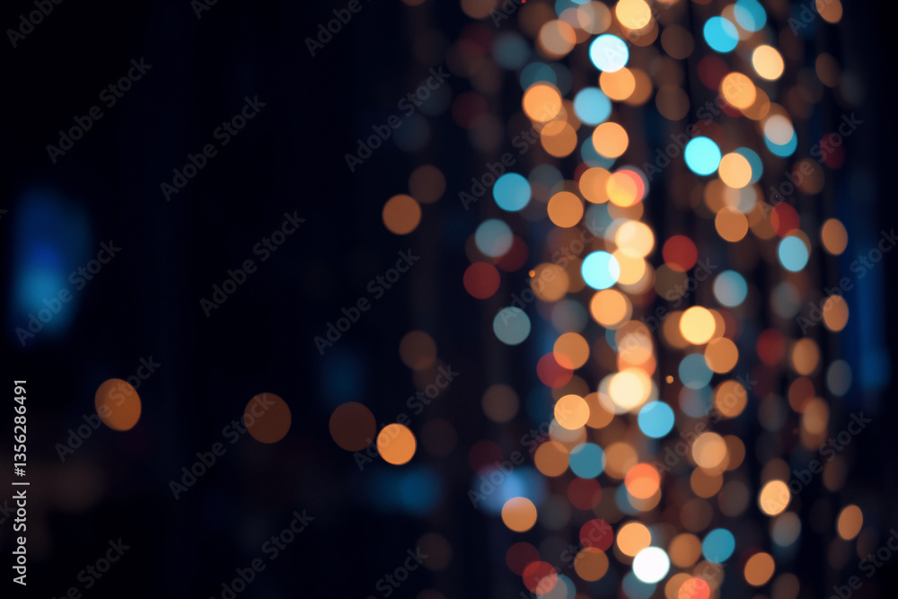 Fototapete blurred lights create an abstract and festive background. warm orange and yellow bokeh blend with co