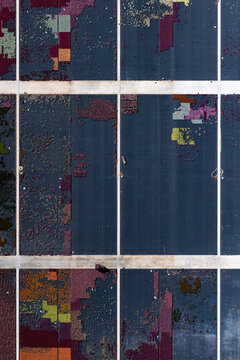 Aerial view of a cultivated field with ornamental flowers in a colorful pattern