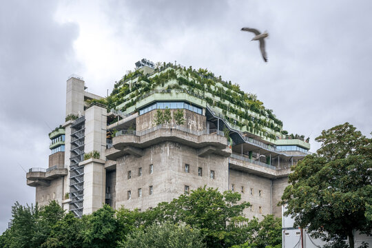 Green Bunker in St. Pauli, Hamburg with vegetation and cloudy sky