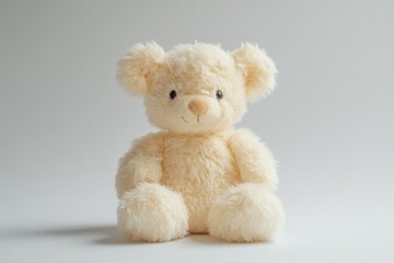 Fototapeta premium A soft fluffy teddy bear with expressive eyes sitting upright