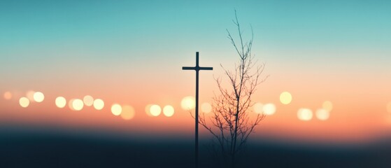 Christian cross silhouette at sunset