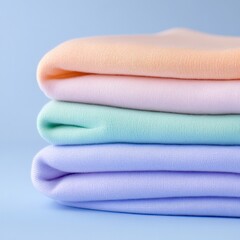 Folded pastel colored laundry