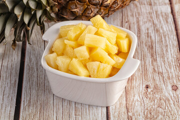 Sweet canned pineapple fruit pieces