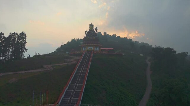 Buddha skywalk in Sikkim. Aerial, drone shot 4k. Aerial view of the foggy day in Pelling, Sikkim. Northern India. Indian Mountain. D Log. Bird eye View. Travelling Northeast Video.
