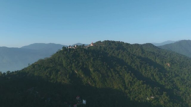 Buddha skywalk in Sikkim. Aerial, drone shot 4k. Aerial view of the foggy day in Pelling, Sikkim. Northern India. Indian Mountain. D Log. Bird eye View. Travelling Northeast Video.
