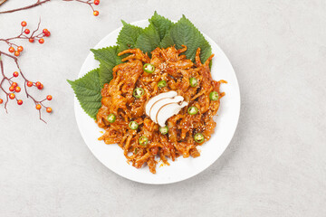  Chicken feet is a dish made by stir-frying trimmed chicken feet with red pepper powder, red pepper...