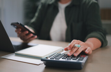 Businessman calculating budget, data analysis, documents, reports, tax refund calculation, tax...