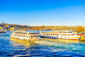 Passenger ferries at Karakoy pier next to Galata Bridge, Istanbul, Turkey