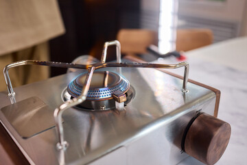 A closeup view showcasing a stylish gas stove adorned with unique and captivating flame patterns
