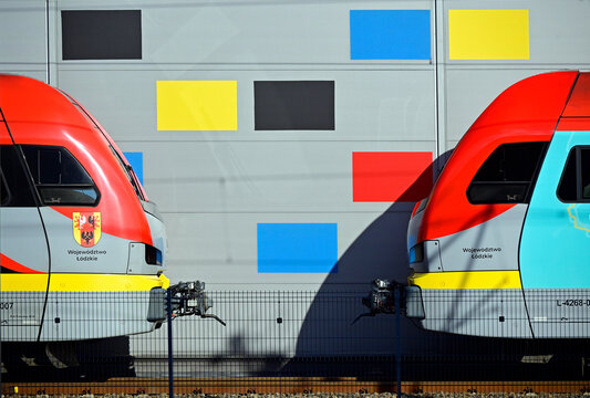Ł&oacute;dź, Poland, Europe - Widzew railway station, Train Stadler FLIRT- Ł&oacute;dzka Kolej Aglomeracyjna (Ł&oacute;dź Metropolitan Railway), inscription 'Wojew&oacute;dztwo Ł&oacute;dzkie'  (Ł&oacute;dź Voivodeship) and Coat of Arms 