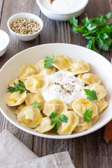 Homemade Russian dumplings. Pelmeni. Traditional Russian Food.