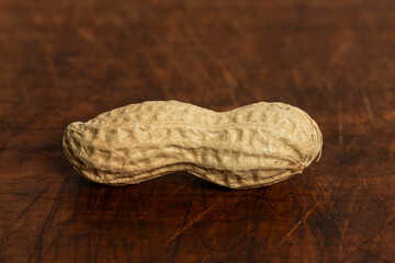Peanut on a brown wooden background