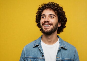 Obraz premium Happy joyful smiling young indian man looking aside up thinking of new good opportunities, dreaming, feeling inspired and proud standing isolated on yellow background. 