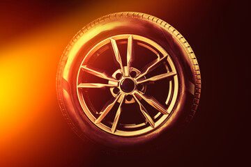 wheel. black background. car wheel with tire. disk is smelted from titanium. close-up. there is...