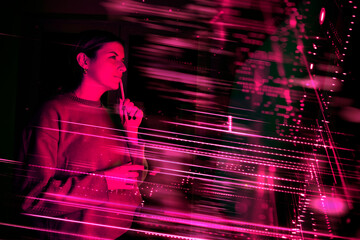 Woman contemplating digital screen in modern office with neon lights