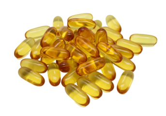 A Heap of Transparent Yellow Gel Capsules on a White Background Showcasing Health Supplements and Nutritional Products for Daily Wellness