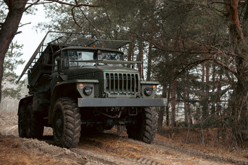 Fototapeta premium Multiple launch rocket system In combat conditions on the battlefield