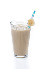 Fresh and healthy banana smoothie in glass isolated on white background