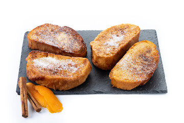 Traditional Spanish torrijas for Holy Week isolated on white background
