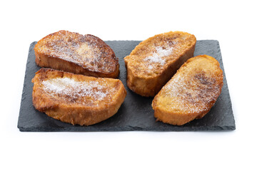 Traditional Spanish torrijas for Holy Week isolated on white background