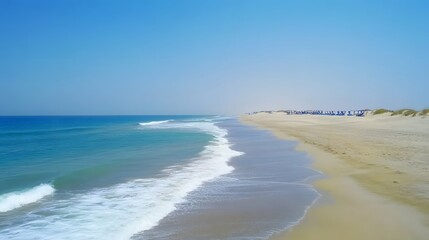 Obraz premium Stunning Aerial View of Sandy Beach and Turquoise Ocean Waves