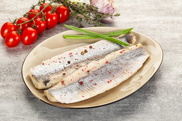 Marinated herring fillet with green onion