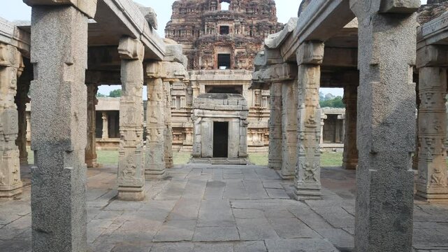 amazing temple complex at Hampi, world famous unesco site, ancient stone walls and mysterious gateways in Karnataka, India