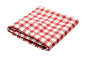 Red and white checkered folded cloth napkin on black background, cut out