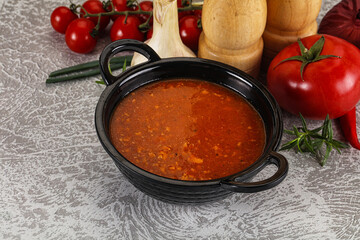 Hot tomato soup with diced chicken