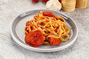 Italian pasta pappardelle with chorizo