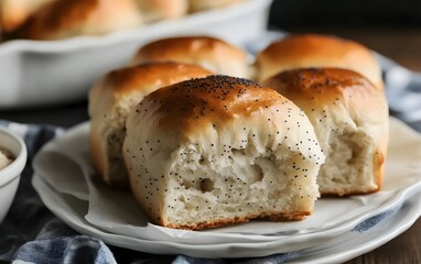 Golden Brown Poppy Seed Dinner Rolls on Plate