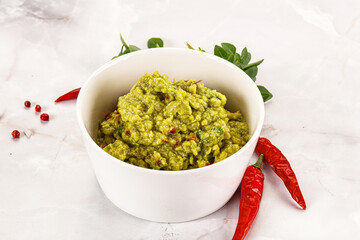 Guacamole with avocado, tomato and chili