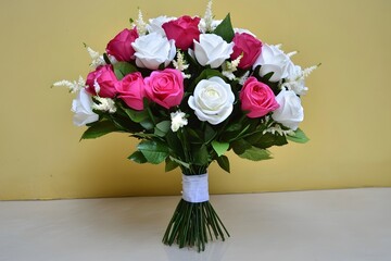Fototapeta premium Beautiful Pink and White Rose Bouquet Artificial Flowers